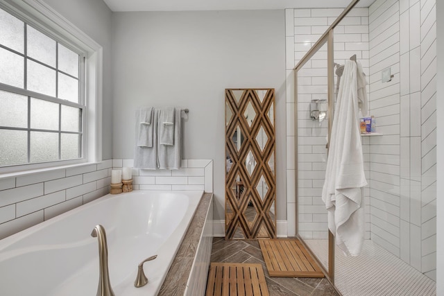 3325 Mariana Oaks Dr, Tallahassee, FL 32311 - bathroom featuring a garden tub and a tile shower