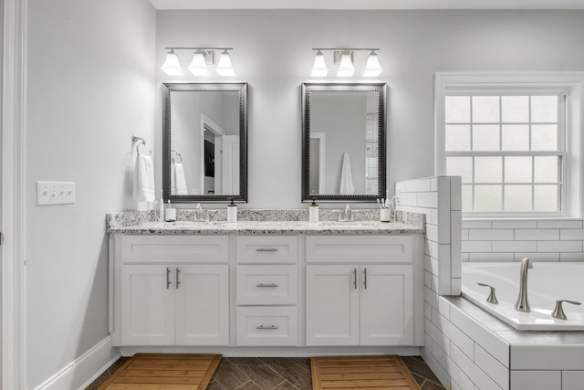 3325 Mariana Oaks Dr, Tallahassee, FL 32311 - bathroom with double vanity and a garden tub