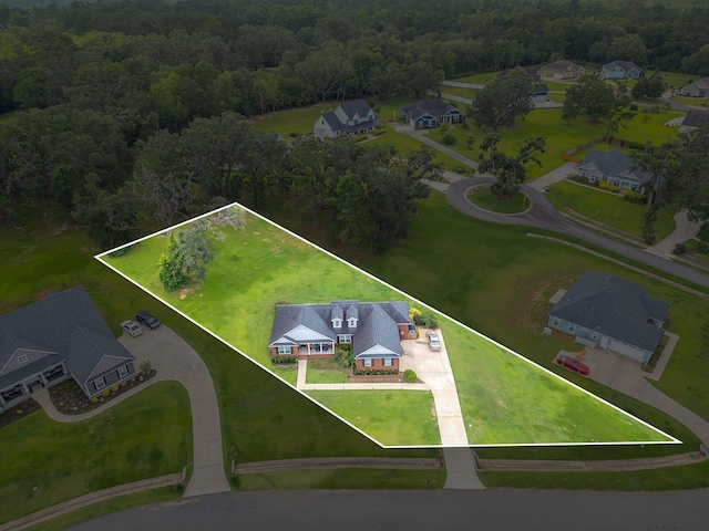3325 Mariana Oaks Dr, Tallahassee, FL 32311 - aerial perspective of suburban area with property boundaries highlighted and a heavily wooded area