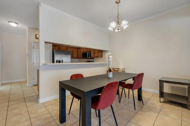 1320 Hendrix Rd Unit 403, Tallahassee, FL 32301 - dining space featuring light tile patterned floors, a chandelier, and ornamental molding