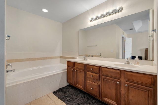1320 Hendrix Rd Unit 403, Tallahassee, FL 32301 - bathroom featuring tile patterned floors, double vanity, and a bath