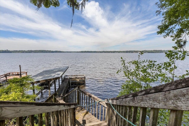 view of dock with a water view