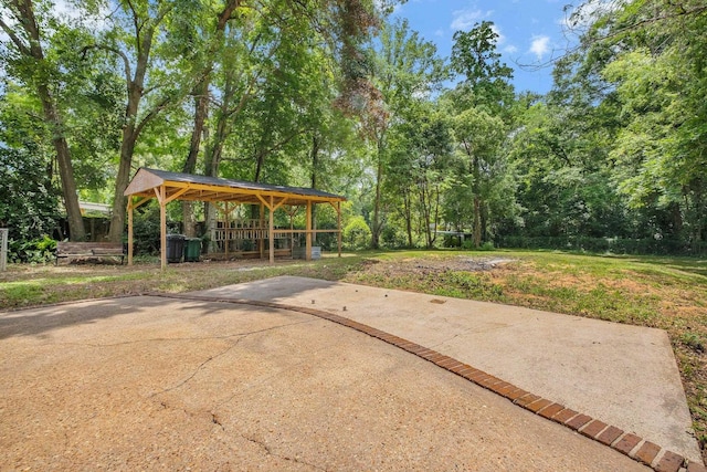 2121 Shadyoaks Dr, Tallahassee, FL 32303 - view of patio / terrace with a gazebo and view of wooded area