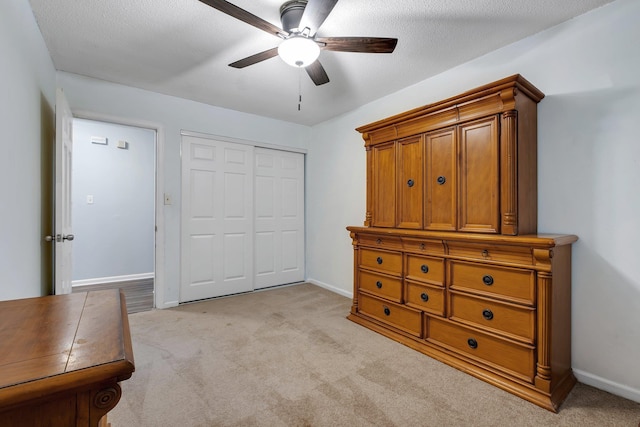 2121 Shadyoaks Dr, Tallahassee, FL 32303 - bedroom featuring light colored carpet, a closet, and a ceiling fan