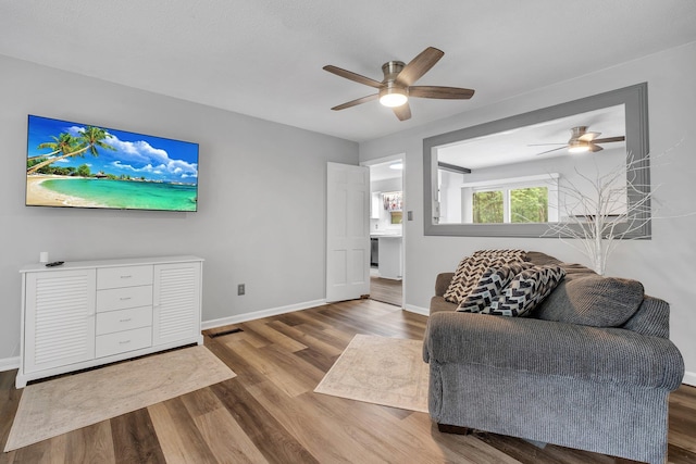 2121 Shadyoaks Dr, Tallahassee, FL 32303 - living room with a ceiling fan and wood finished floors