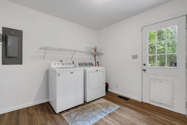 2121 Shadyoaks Dr, Tallahassee, FL 32303 - laundry room featuring electric panel, separate washer and dryer, and wood finished floors