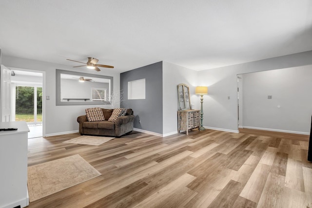 2121 Shadyoaks Dr, Tallahassee, FL 32303 - living area with ceiling fan and light wood-style floors