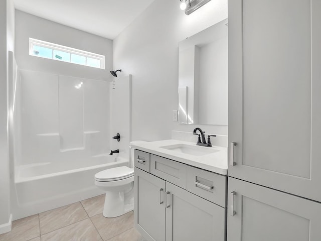 full bathroom featuring tile patterned floors, vanity, toilet, and washtub / shower combination