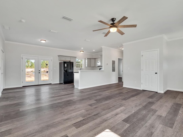 unfurnished living room featuring ceiling fan, french doors, dark hardwood / wood-style floors, and ornamental molding