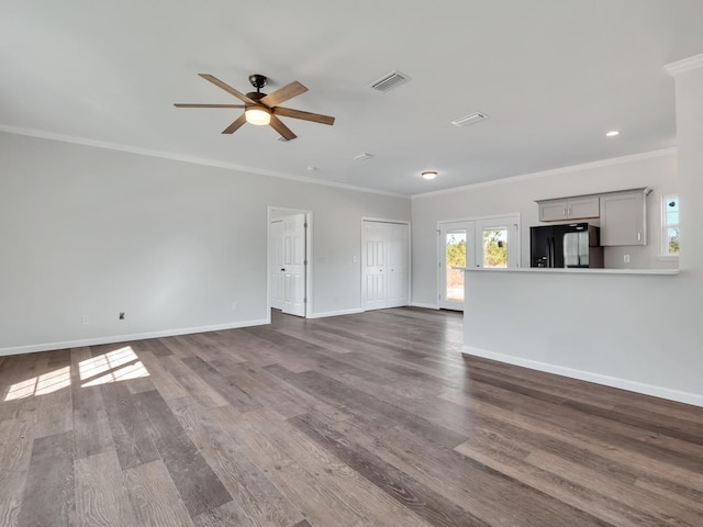 unfurnished living room with dark hardwood / wood-style floors, ceiling fan, crown molding, and french doors