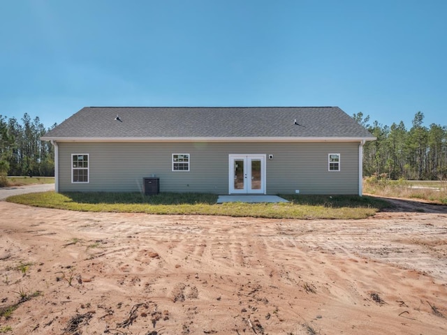 back of house featuring french doors