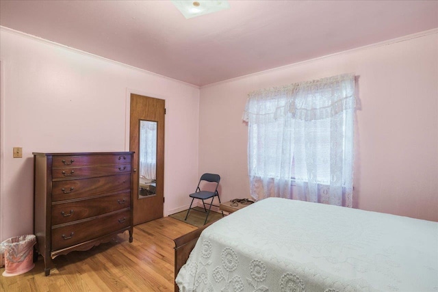 bedroom featuring wood finished floors