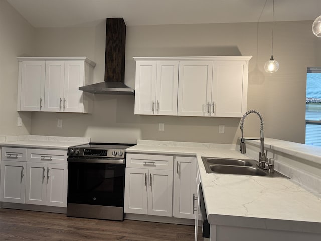 kitchen featuring wall chimney range hood, a sink, white cabinets, and stainless steel electric stove