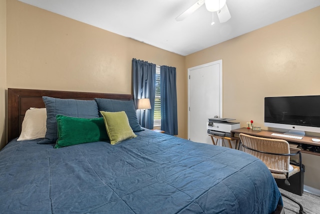 bedroom featuring ceiling fan and carpet floors