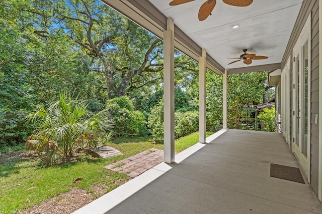 view of patio featuring ceiling fan