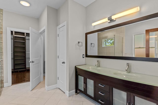 bathroom with vanity and tile patterned floors