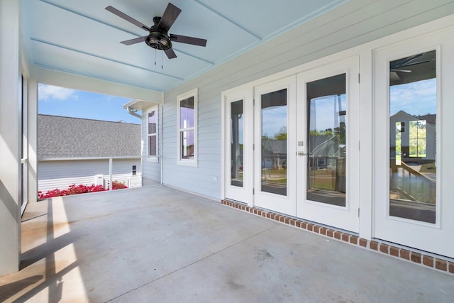 view of patio with french doors and ceiling fan