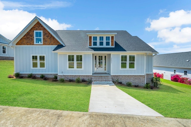 craftsman-style house with a front yard