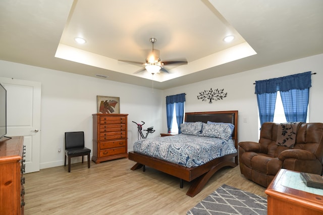 359 Mae Cato Dr, Midway, FL 32343 - bedroom with a raised ceiling, light wood finished floors, baseboards, recessed lighting, and a ceiling fan