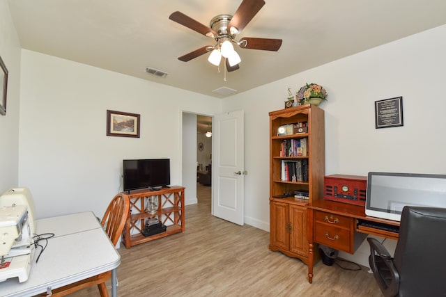 359 Mae Cato Dr, Midway, FL 32343 - office space featuring light wood-type flooring and a ceiling fan