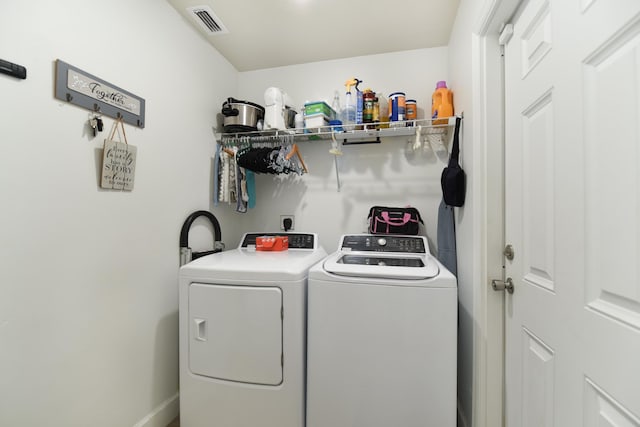 359 Mae Cato Dr, Midway, FL 32343 - washroom with washing machine and dryer and baseboards