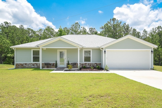 359 Mae Cato Dr, Midway, FL 32343 - ranch-style house featuring stone siding, an attached garage, driveway, a front yard, and a shingled roof