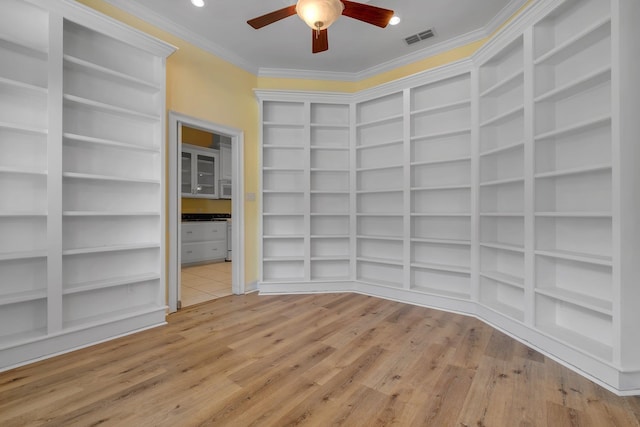 4653 Soaring Way, Tallahassee, FL 32311 - spare room featuring built in features, ceiling fan, crown molding, light wood-style floors, and recessed lighting