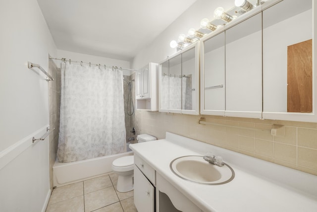 full bathroom with tile patterned flooring, toilet, vanity, backsplash, and shower / bath combo