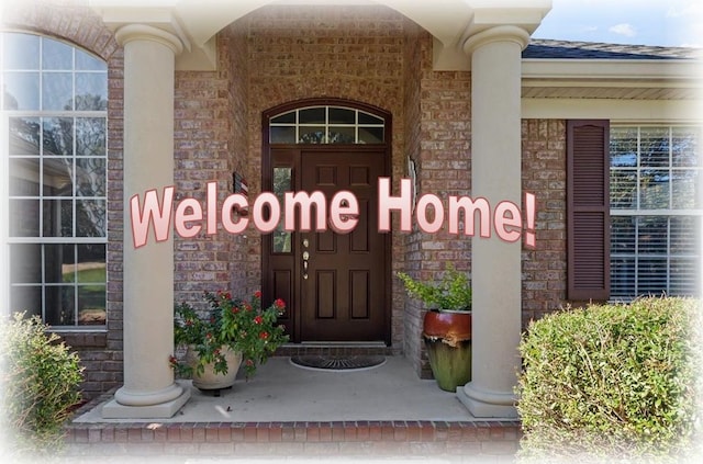 8086 Ronds Pointe Ct, Tallahassee, FL 32312 - doorway to property with roof with shingles
