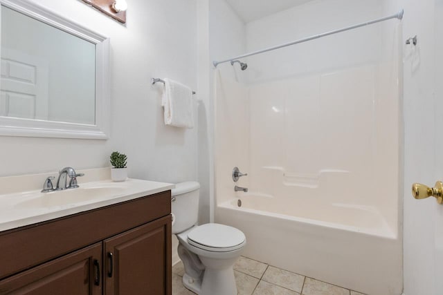 full bathroom with tile patterned flooring, vanity, washtub / shower combination, and toilet