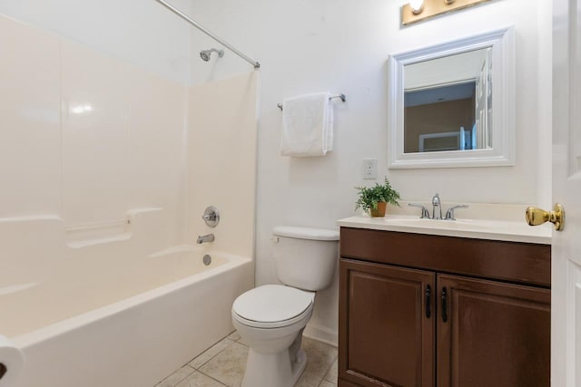 full bathroom featuring tile patterned flooring, vanity, tub / shower combination, and toilet