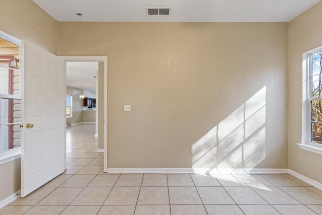 view of tiled spare room