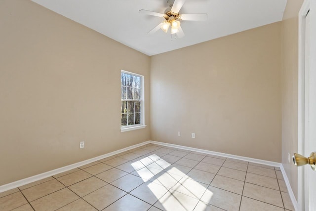 unfurnished room with light tile patterned floors and ceiling fan