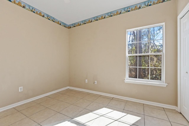 view of tiled spare room