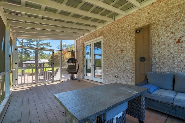 unfurnished sunroom with french doors