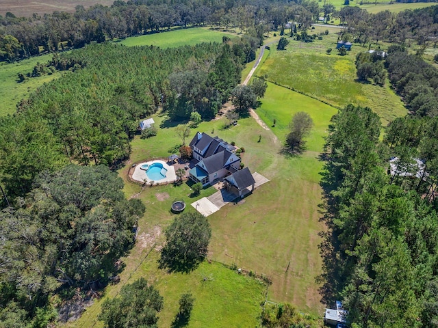 aerial view featuring a view of trees