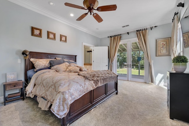 carpeted bedroom featuring visible vents, access to exterior, crown molding, french doors, and recessed lighting