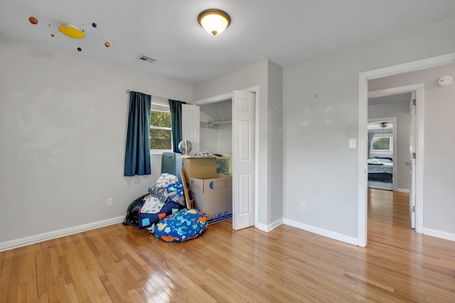 unfurnished bedroom featuring hardwood / wood-style floors