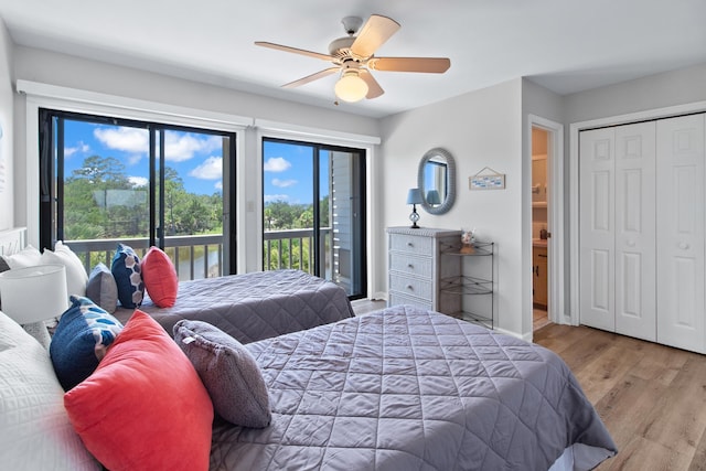 22 Lighthouse Pt, Crawfordville, FL 32327 - bedroom with access to exterior, wood finished floors, and a ceiling fan