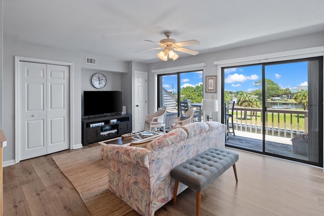 22 Lighthouse Pt, Crawfordville, FL 32327 - living room featuring ceiling fan and light wood-style flooring