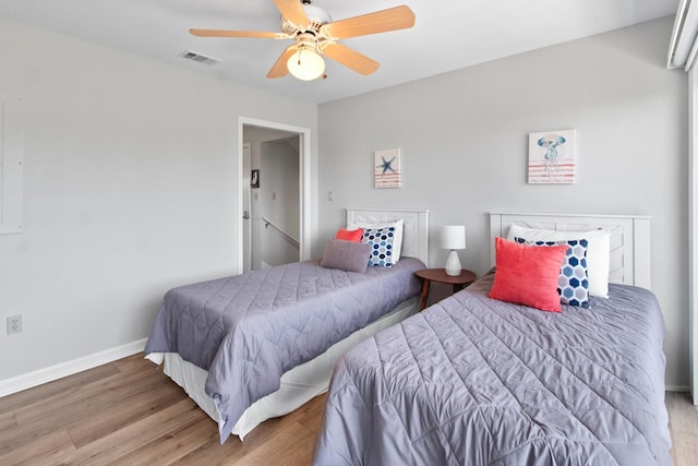 22 Lighthouse Pt, Crawfordville, FL 32327 - bedroom featuring wood finished floors and ceiling fan