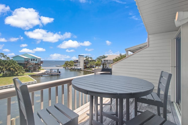22 Lighthouse Pt, Crawfordville, FL 32327 - deck with a water view and a dock