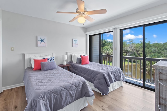 22 Lighthouse Pt, Crawfordville, FL 32327 - bedroom featuring access to outside, wood finished floors, and ceiling fan