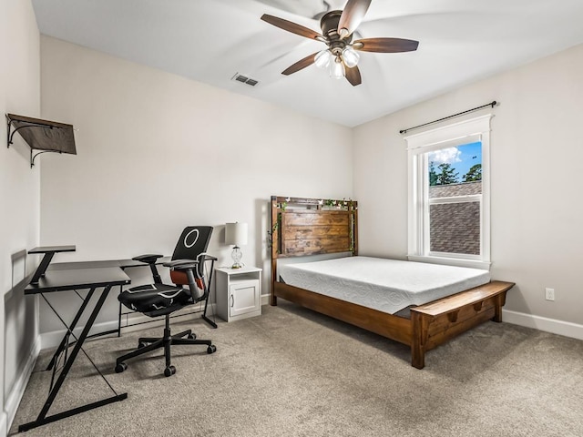2288 Wabash Trl, Tallahassee, FL 32303 - bedroom with light colored carpet and ceiling fan