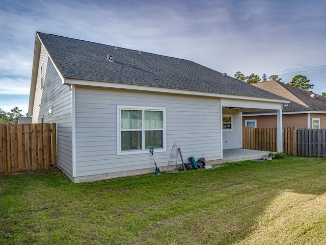 2288 Wabash Trl, Tallahassee, FL 32303 - back of property featuring a patio area, a shingled roof, and a fenced backyard