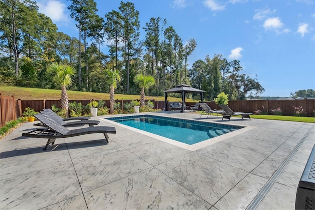 view of pool with a gazebo and a patio area