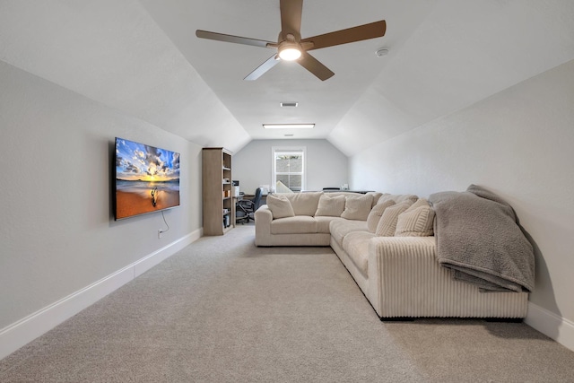 carpeted living room featuring ceiling fan and lofted ceiling