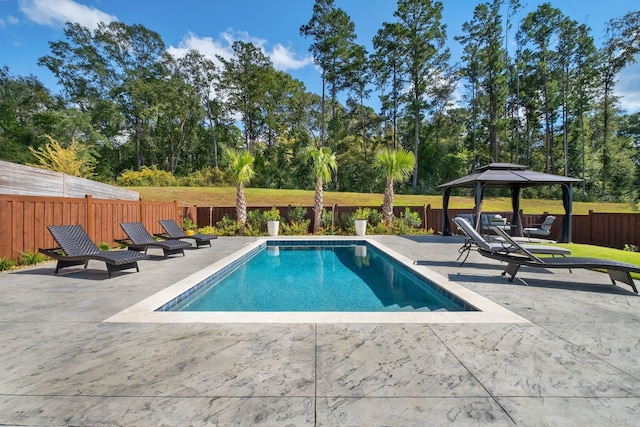 view of pool with a gazebo and a patio