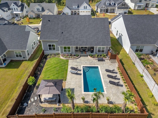 exterior space with an outdoor hangout area and a patio