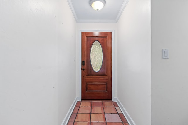 doorway to outside with light tile patterned floors and crown molding